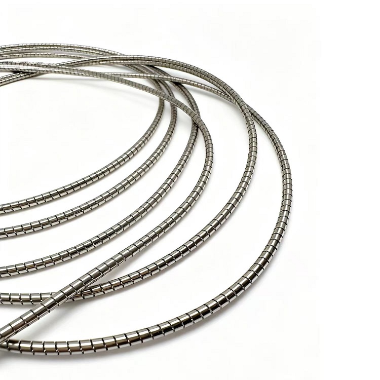 Nickel-plated beryllium copper spiral shielding tube with high elasticity for EMI protection.